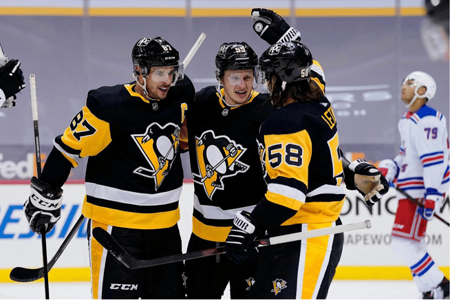 Pittsburgh Penguins players congratulating themselves